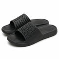 Ciabatte slide 38/39 in materiale sintetico nero con fascia traforata per uso quotidiano